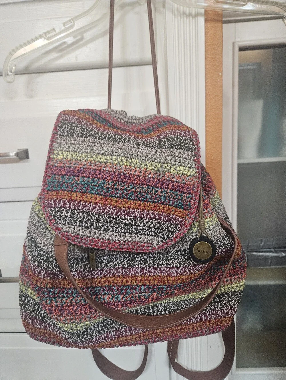 The Sak Striped Crochet Multicolor Backpack with Brown Trim